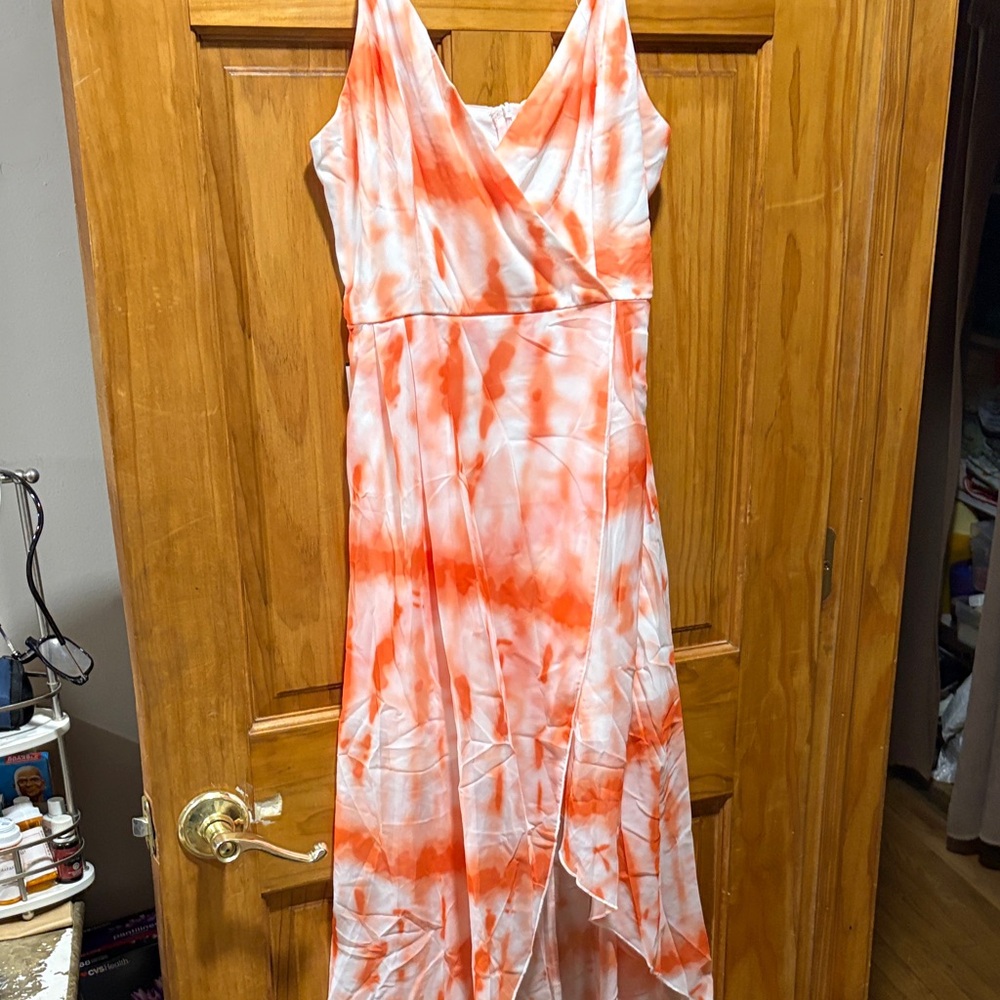 Two Chic Asymmetrical Orange Tie-Dye Dress each 35 dollars